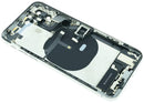 Tapa trasera plateada para iPhone XS (A1920, A2097) con puerto de carga y pequeños componentes preinstalados.