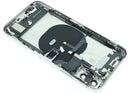 Tapa trasera plateada usada para iPhone XS (A1920, A2097) con puerto de carga y componentes preinstalados.