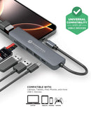 Splitter USB C PowerPeak 6 en 1 a HDMI plateado, con puertos USB y lector de tarjetas.