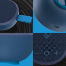 Altavoz inalámbrico portátil Skullcandy Ounce XT azul oscuro, compacto y resistente al agua, con correa de transporte.