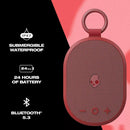 Altavoz Bluetooth Skullcandy Kilo XT rojo, portátil, resistente al agua, con correa y controles integrados.