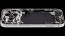 Tapa trasera plateada usada para iPhone 17 Pro A3256 con puerto de carga flex y piezas pequeñas, lista para reparación.