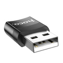Adaptador HOCO UA17 negro USB 2.0 macho a USB Type-C hembra, ideal para conectar accesorios y cargar dispositivos.