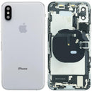 Tapa trasera plateada usada para iPhone XS (A1920, A2097) con puerto de carga y componentes preinstalados.