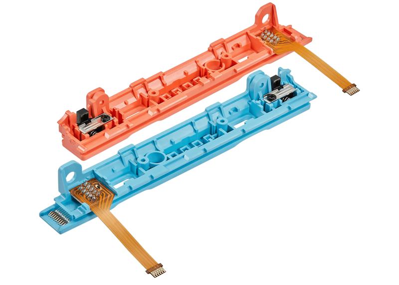 Encuentra el par de rieles plásticos con cable flex para Nintendo Switch 2 en Guatemala, disponibles en color azul y naranja.