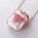 Funda de AirPods 1/2 rosa brillante con diseño de botella de perfume y cadena para un estilo lujoso.