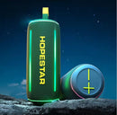 Altavoz deportivo portátil HOPESTAR P58 verde, resistente al agua, con asa y rejilla negra.
