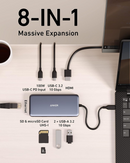 Hub USB-C Anker 555 Powerexpand 8 en 1 gris espacial, con múltiples puertos para expansión de datos.