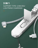 Puerto de carga de viaje LDNIO LC130 3 en 1, blanco, con cables USB-C, Lightning y Micro-USB.
