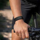 Banda fitness inteligente QWatch Pro color naranja con pantalla táctil, monitor de frecuencia cardíaca y correa ajustable.