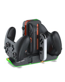 Soporte de carga Dobe para dos Joy-Con de Nintendo Switch, base negra con indicadores LED.