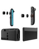 Protege tu consola Switch 2 con el set de tapones contra polvo Dobe en Guatemala, disponible en SlowBack y otros mayoristas de accesorios.