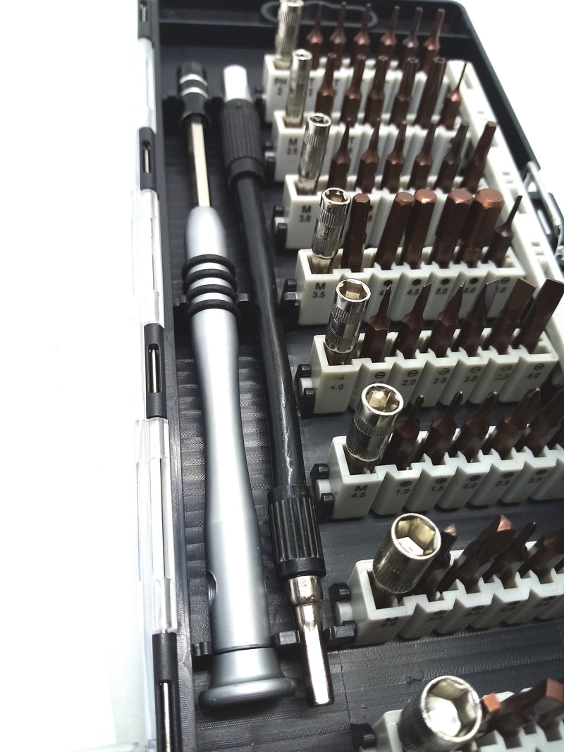 Desarmador de Aluminio con 56 puntas para reparar celulares y computadoras.